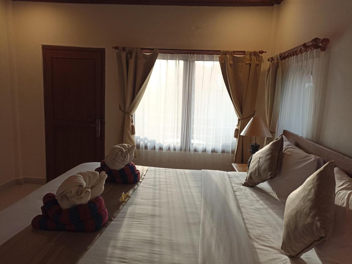 Kusnadi Hotel Легиан Экстерьер фото