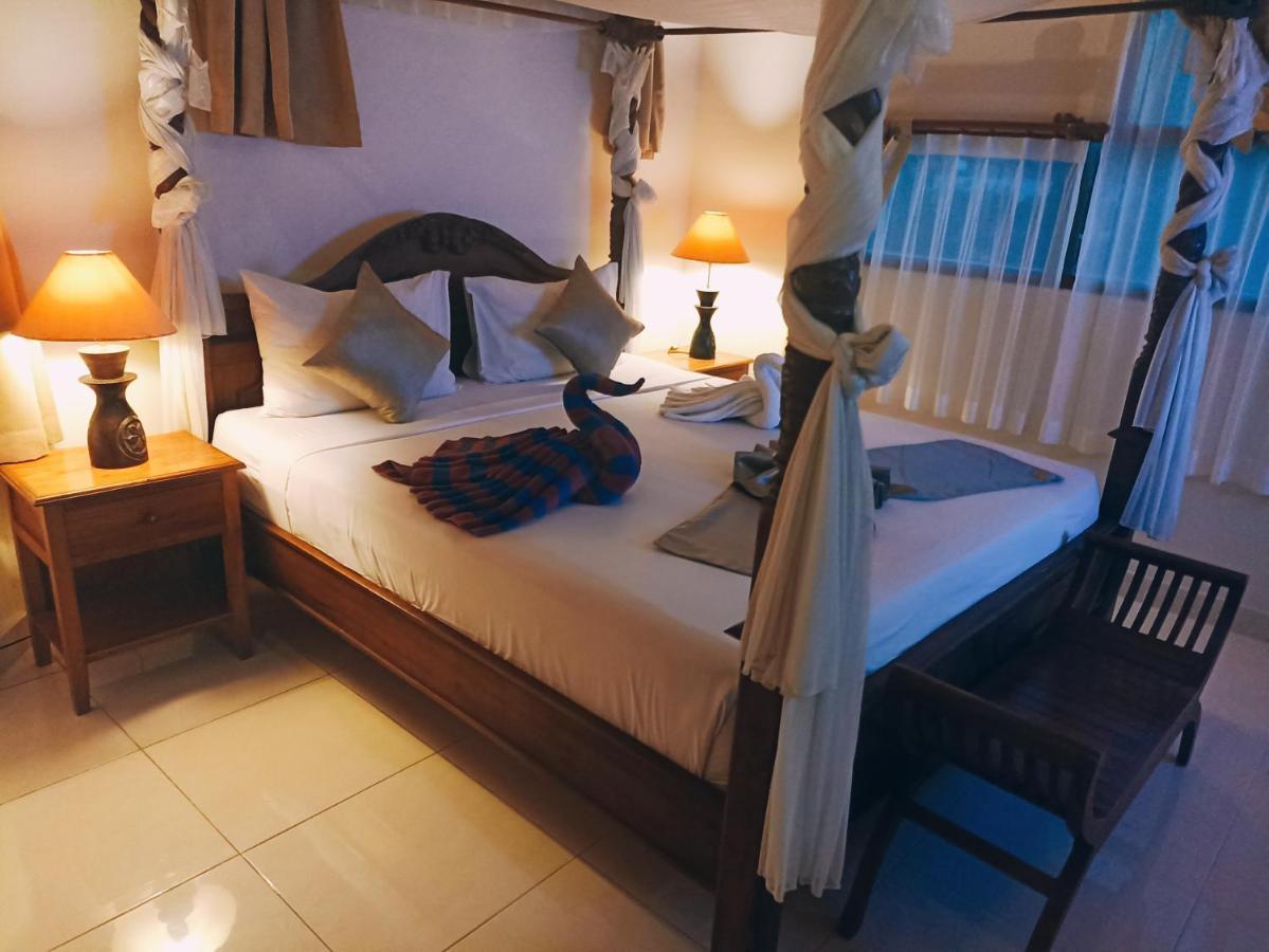 Kusnadi Hotel Легиан Экстерьер фото