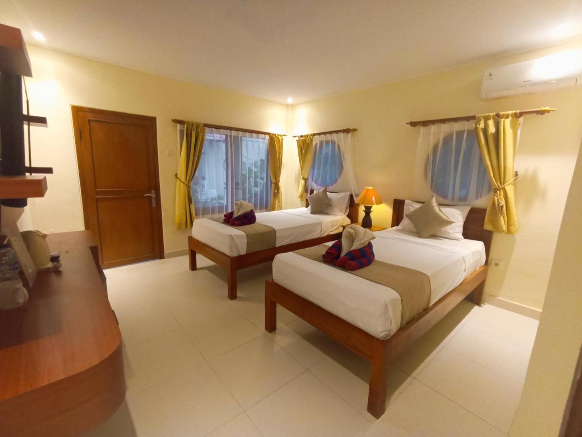 Kusnadi Hotel Легиан Экстерьер фото