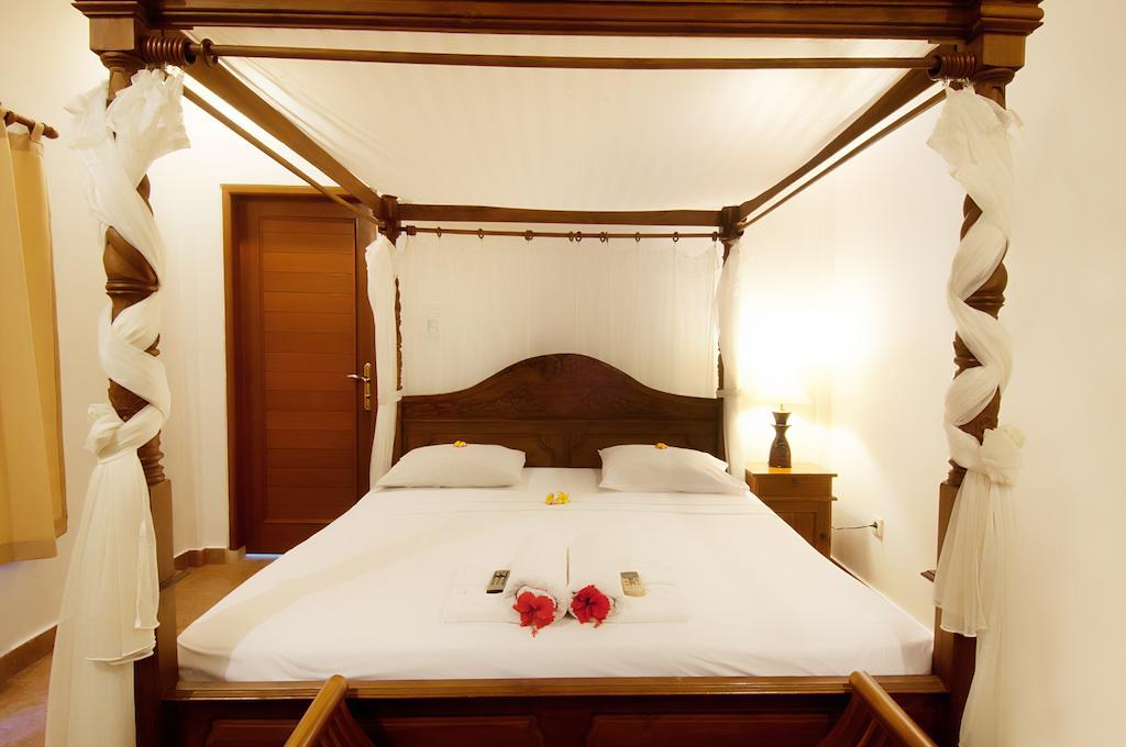 Kusnadi Hotel Легиан Экстерьер фото