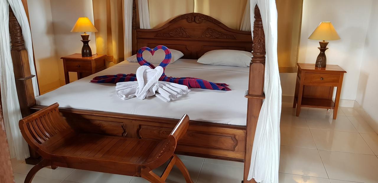 Kusnadi Hotel Легиан Экстерьер фото