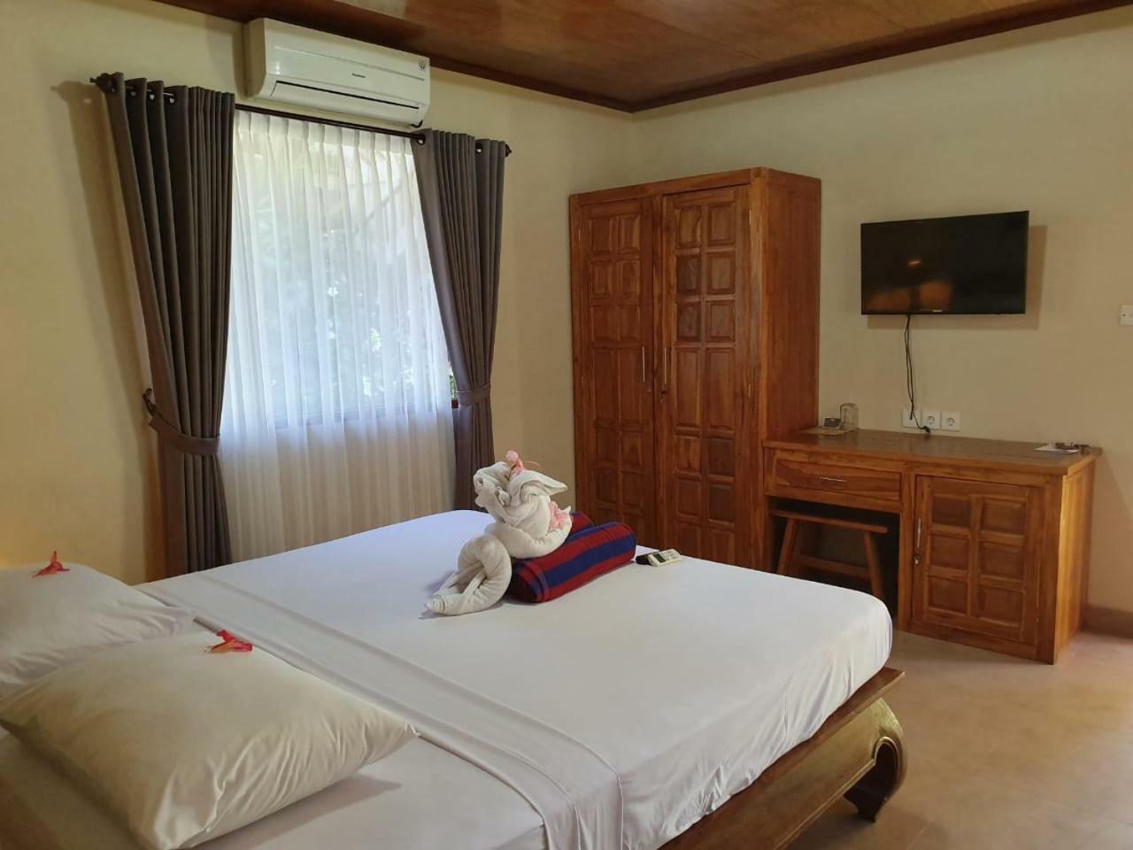 Kusnadi Hotel Легиан Экстерьер фото